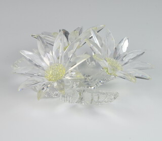 A Swarovski Crystal group of flower heads 8cm, boxed