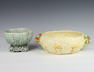 A Clarice Cliff moulded bowl decorated with fruits and wheat 22cm together with a Beck bowl decorated with flowers 15cm 