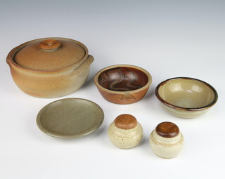 A Winchcombe Studio Pottery casserole and cover 20cm, ditto handled dish 18cm, 2 shallow dishes 14cm and a salt and pepper