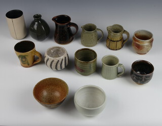 A Jeremy Leach Studio Pottery Harrow School mug, a John Leach flared neck bowl, a Walter Keeler brown glazed jug and 10 other Studio Pottery vessels 