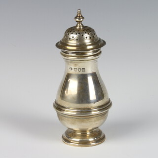 An Edwardian silver baluster pepper pot in the Queen Anne style, London 1907, 112 grams, 14cm 