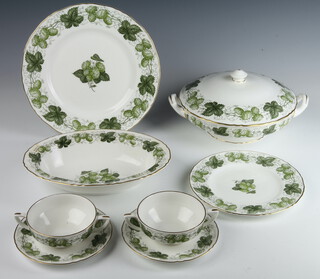 A Royal Worcester "The Worcester Hop Mathon" part dinner service comprising eight 2 handled bowls (1 a/f, 1 cracked), 8 saucers, 7 small plates (1 a/f), 8 medium plates, 10 dinner plates, 1 oval meat plate, 2 oval vegetable dishes, a sauce boat stand, 2 circular tureens and covers  