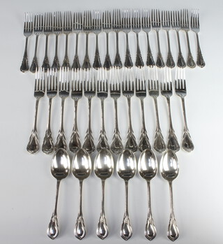 Eighteen silver plated lily pattern dessert forks, 12 dinner forks and 6 dessert spoons