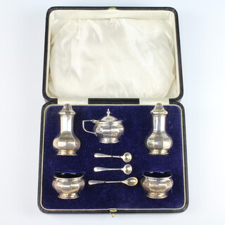 A silver 5 piece octagonal condiment set Birmingham 1923, 140 grams, cased