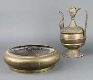 A circular Chinese gilt metal bowl of squat form engraved court figures on a plain base 10cm x 33cm together with an embossed brass Turkish coffee pot 30cm x 14cm 