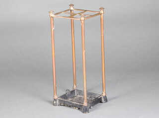 A Victorian copper and iron 4 section stick/umbrella stand complete with drip tray 55cm h x 23cm w x 20cm d 