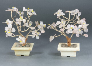A pair of Chinese hardstone ornaments in the form of trees contained in rectangular hardstone pots 17cm h x 7cm w x 5cm d  