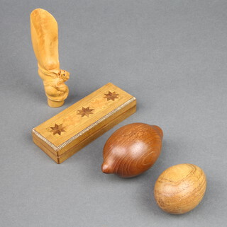 A Chinese carved bamboo scoop decorated a dragon 2cm x 10cm the base with signature, a 4 section stamp box 2cm x 11cm x 4cm, a carved wooden model of a lemon 7cm, ditto egg 5cm 