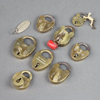 Three Victorian brass heart shaped padlocks complete with keys 4cm x 3cm and 2cm x 2cm, together with 5 other brass and steel padlocks (no keys) 
