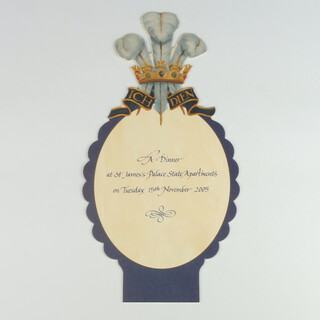 Of Royal Interest, a cut out menu card for a dinner at St James's Palace, State Apartments, dated Tuesday 15th November 2005, the top of the card in the form of The Prince of Wales's feathers, designed by Alex Cobbe approx. 15cm wide x 30cm high