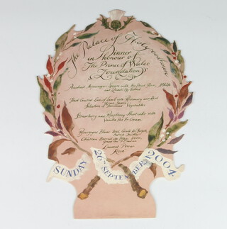 Of Royal Interest, a cut out menu card dated 26th September 2004 for a dinner at The Palace of Holyrood House in Honour of The Prince of Wales Foundation, the card in the form of a laurel surmounted a white thistle, designed by Alex Cobbe approx. 20cm w x 30cm h