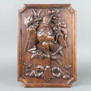 A Victorian carved oak panel of a standing bird 48cm x 34cm  
