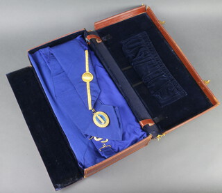A quantity of Masonic regalia comprising Junior Grand Wardens Undress apron, collar and jewel, London Grand Chapter Rank apron, sash, collar and jewel and a Royal Arch Companions apron, all contained in a leather case 