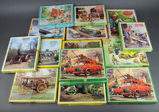 A Victory jigsaw puzzle "Seaside Traffic", ditto "Little Engine Cleaner" and 13 others -  1919 Garrett Railway steam traction engine, 1927 Wallis & Stephens steam roller, 1911 Rolls Royce, Trafalgar Square, Emergency Services, Lifeboat, Animal Friends Series, Motoring, Emergency Services Fire (x2), Still Life Series No.2, 1902 Foster Traction Engine 

