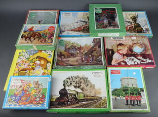 Eleven Victory jigsaw puzzles - Famous Steam Engine Series Duchess of Atholl (x2), ditto Lemberg, Story Book Stories There Was an Old Woman, Vernon Ward painting, Neighbours, Map puzzle, Garden with Rose Arch, Windsor Castle, The Cowboy Rodeo and The Rabbits Picnic, all boxed 