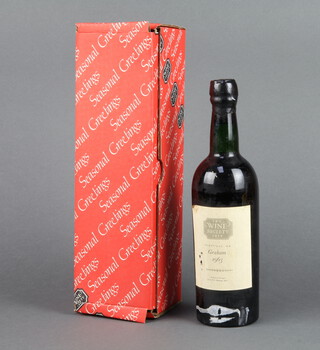 A bottle of I.E.C Wine Society Graham 1963 port 
