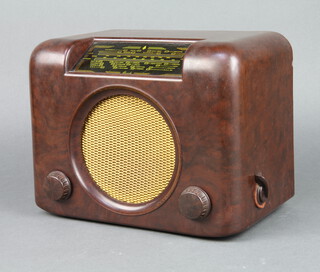 A Bush type DAC.90A radio contained in a brown Bakelite case 12cm x 30cm x 18cm  
