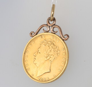 A George IV sovereign 1826 with 9ct scroll mount 