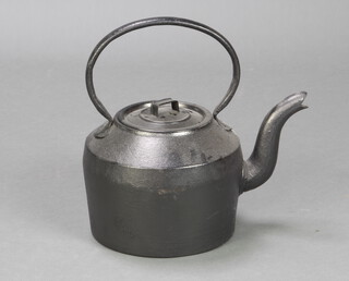 A 19th Century circular cast iron stove kettle 36cm h x 28cm with associated lid 
