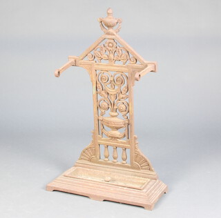 A Victorian pierced cast iron umbrella stand with drip tray, the back marked RD929093 79cm h x 49cm w x 20cm d  
