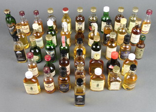 44 various miniature bottles of malt and blended whisky and brandy including Blair Athol, The Glamis, Clan Campbell 12 year old, Johnnie Walker Gold Label & others  