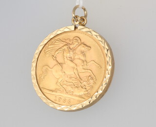 A sovereign 1966 contained in a 9ct yellow gold mount 0.9 grams, total weight 8.9 grams 