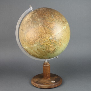 A unmarked 1950's terrestrial globe, raised on a turned oak base, the base fitted a compass 50cm h 
