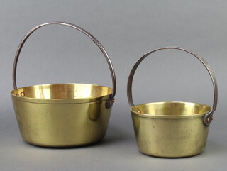 A polished brass and steel preserving pan 25cm x 17.5cm together with 1 other 12cm x 24cm 
