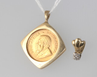 A 1/10th of a Krugerrand 1990, contained in a diamond set 9ct yellow gold 2.5 gram mount 