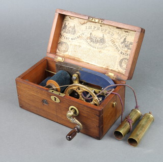The Improved Electric Shock Machine, contained in a mahogany case with hinged lid 11cm x 21cm x 12cm 