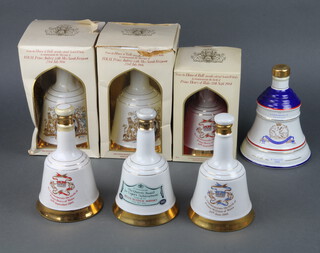 Three 75cl Bells whisky decanters together with 4 50cl ditto  