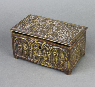 A 19th Century rectangular brass casket with hinged lid decorated scenes from the life of Christ 7cm h x 15cm w x 9cm d 
