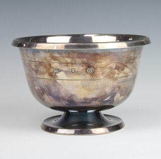 A Silver pedestal bowl with applied floral decoration, retailed by Aspreys London 1976, 584 grams, 19cm  
