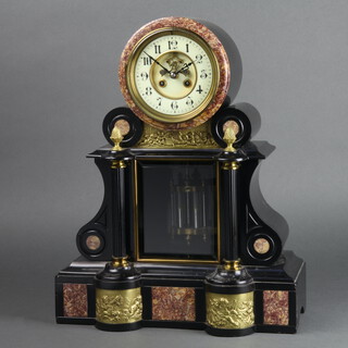 J Marti, a 19th Century French 8 day striking on bell mantel clock with visible escapement, enamelled dial and Arabic numerals, contained in a black and pink marble case, having a twin mercurial pendulum and gilt metal mounts 48cm h x 38cm w x 15cm d 