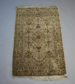 A pink and blue ground Northwest Persian silk rug with central medallion 156cm x 94cm 