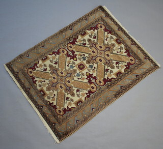 A brown and white ground Persian rug 124cm x 95cm 