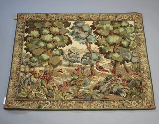 A machine made tapestry panel decorated birds amidst a country landscape 127cm x 155cm 