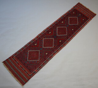 A red and blue ground Meshwani runner with 4 octagons to the centre 248cm x 60cm 