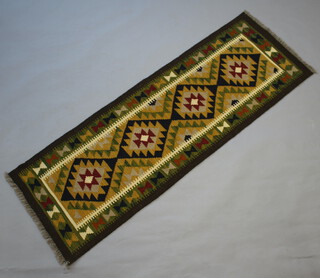 A yellow, green and orange ground Maimana Kilim runner with all-over geometric design 215cm x 66cm 