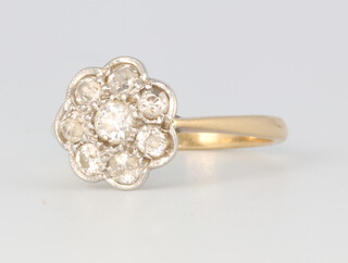 A yellow metal 8 stone diamond daisy cluster ring, approx. 0.40ct, 2.3 grams, size J 1/2 