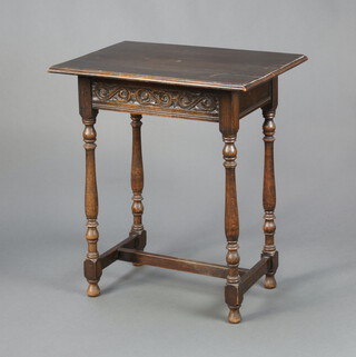A Victorian 17th Century style carved oak side table, with carved apron, raised on turned and block supports with H framed stretcher 76cm h x 66cm w x 45cm d 