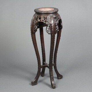 A 19th Century Chinese carved and pierced hardwood jardiniere stand with pink veined marble top, raised on cabriole supports with X framed stretcher 93cm h x 27cm 