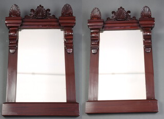 A pair of William IV rectangular plate pier mirrors contained in carved mahogany frames 86cm h x 53cm w 