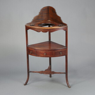 A Georgian mahogany corner wash stand, the upper section with 3 bowl receptacles, the base fitted a drawer with undertier, raised on outswept supports 102cm x 30cm w x 54cm 