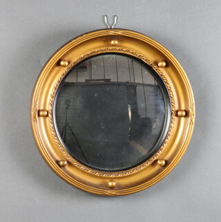 A 1950's Georgian style circular convex plate mirror contained in a ball studded frame 4cm h x 33cm w 
