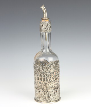A silver plated mounted decanter decorated with cavorting cherubs 35cm 