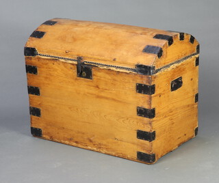 A Victorian domed pine and metal bound twin handled trunk 66cm h x 84cm w x 50cm d 