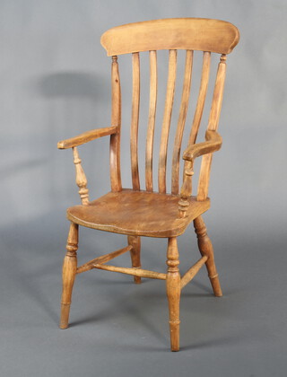 A 19th Century elm and beech stick and rail back Windsor kitchen chair, raised on turned supports with H framed stretcher 108cm h x 53cm w x 40cm d (seat 30cm x 32cm) 