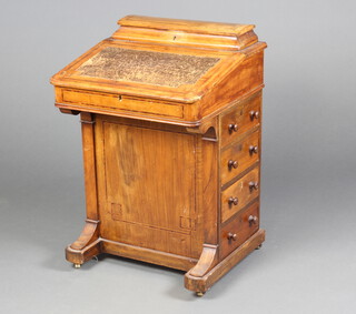 A Victorian inlaid mahogany Davenport, the top with raised stationery box, the pedestal fitted 4 drawers 79cm h x 53cm w x 52cm d 