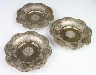 A set of 3 Persian white metal dishes with engraved floral decoration 17cm, 570 grams 